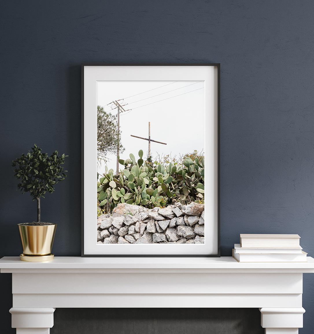 dark home decor features neutral minimal print with cross and cactus