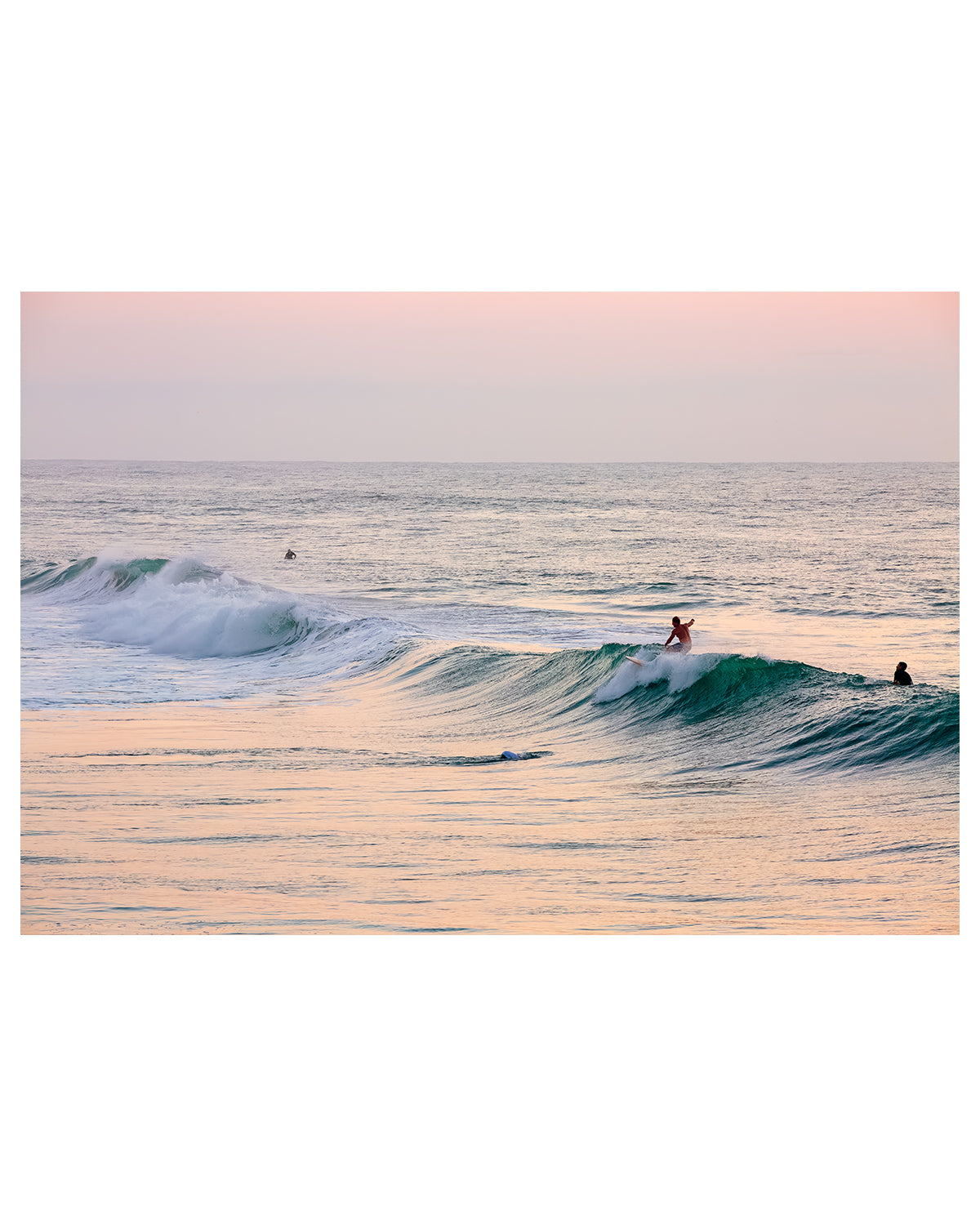 surfing wrightsville beach pink sunrise