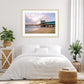 bedroom decor featuring framed pier beach wall art print by Wright and Roam