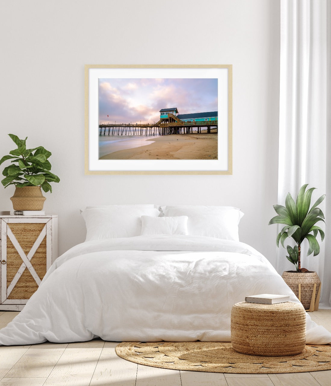 bedroom decor featuring framed pier beach wall art print by Wright and Roam