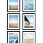 set of six blue beach photographs, black wood frame, by Wright and Roam