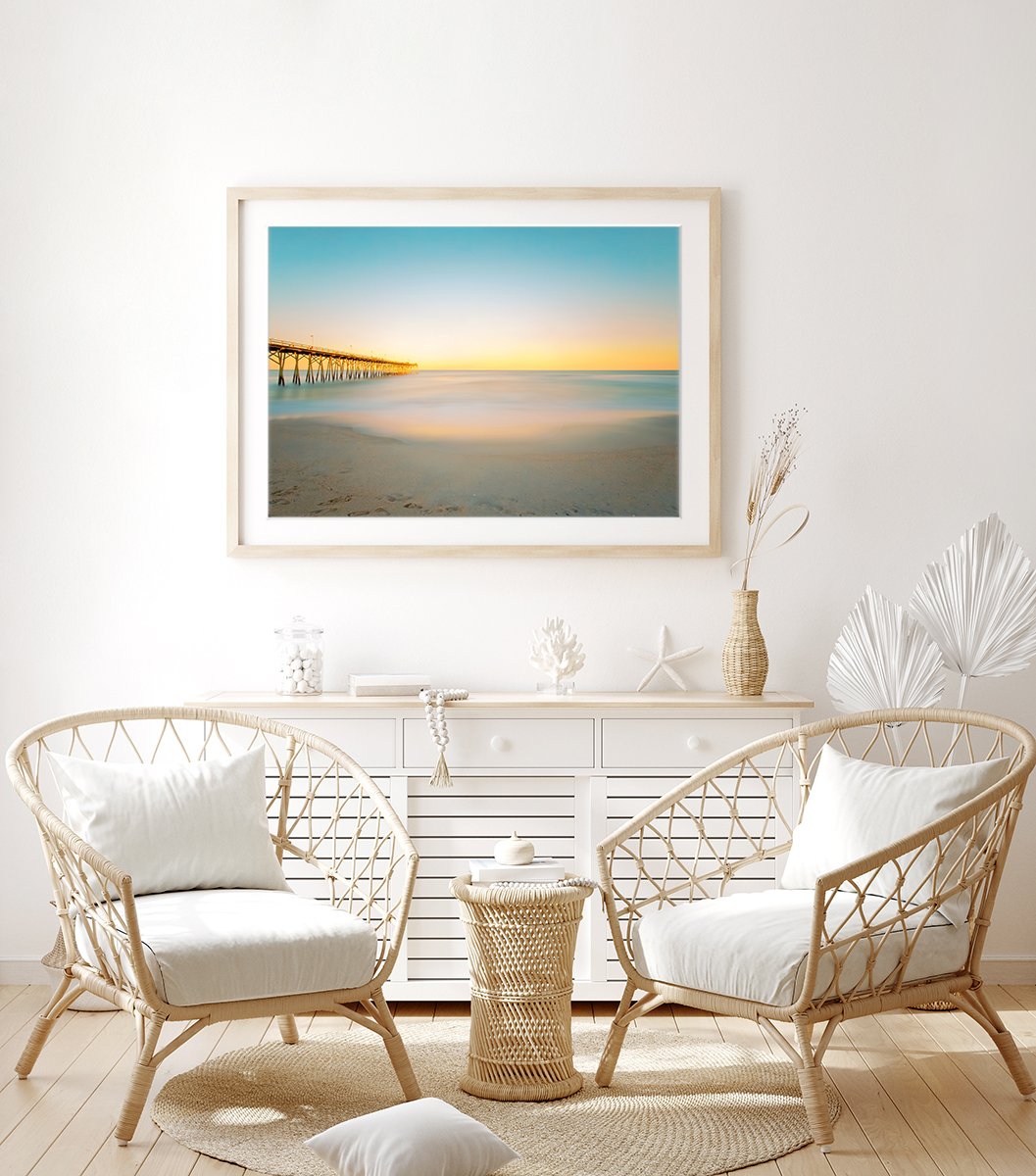 boho coastal decor featuring blue and yellow sunset beach photograph by Wright and Roam
