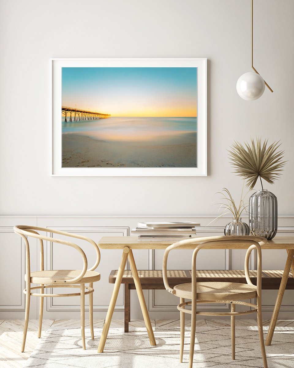 boho modern dining room decor featuring blue and yellow sunset beach photograph by Wright and Roam