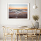 boho modern dining room decor featuring large framed sunset beach photograph by Wright and Roam