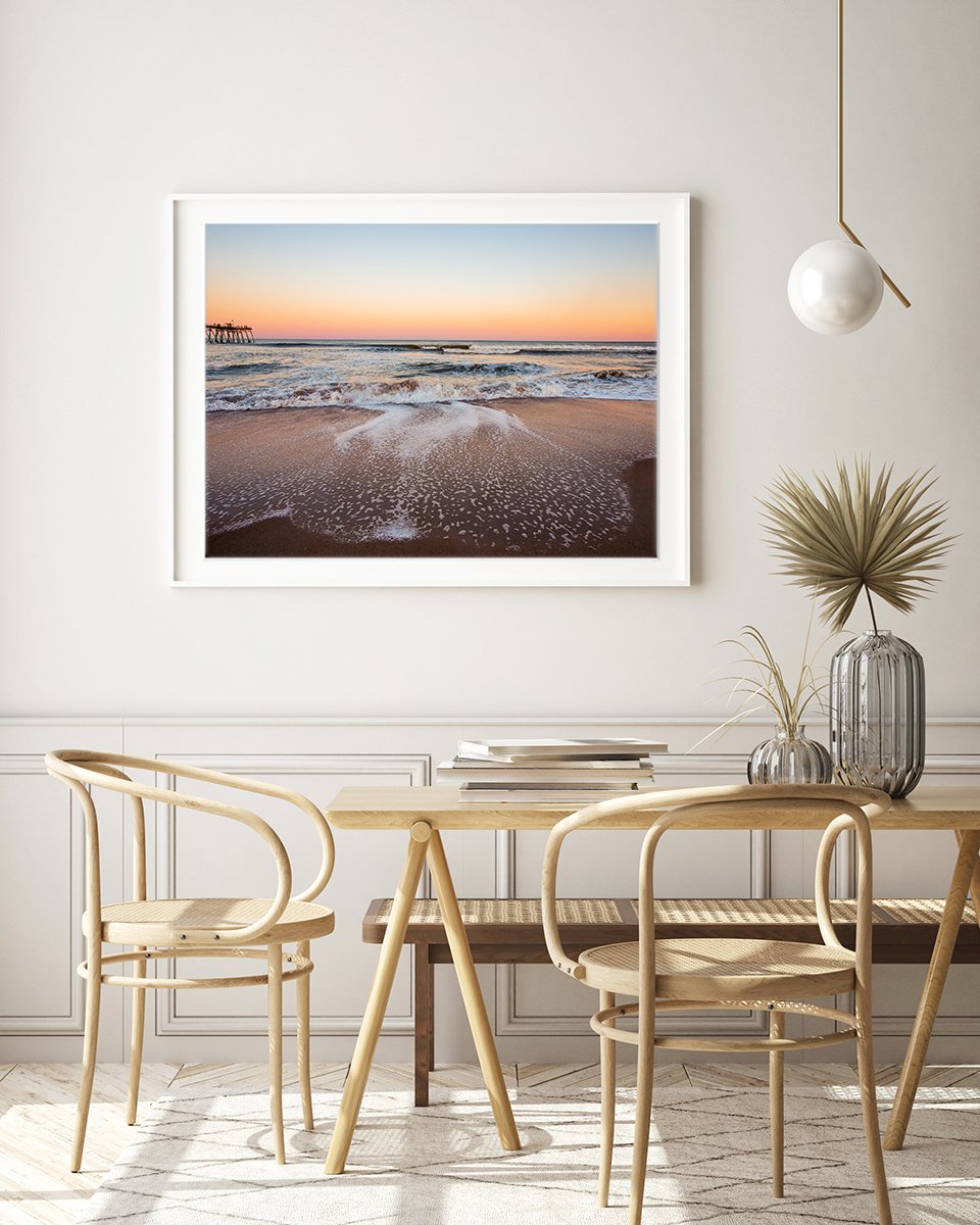 boho modern dining room decor featuring large framed sunset beach photograph by Wright and Roam