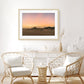 coastal living room decor featuring large sunset wall art photograph by Wright and Roam