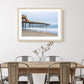 dining room decor featuring framed blue pier wall art photograph by Wright and Roam