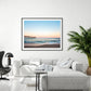 modern living room decor, grey couch, large blue beach photograph by Wright and Roam