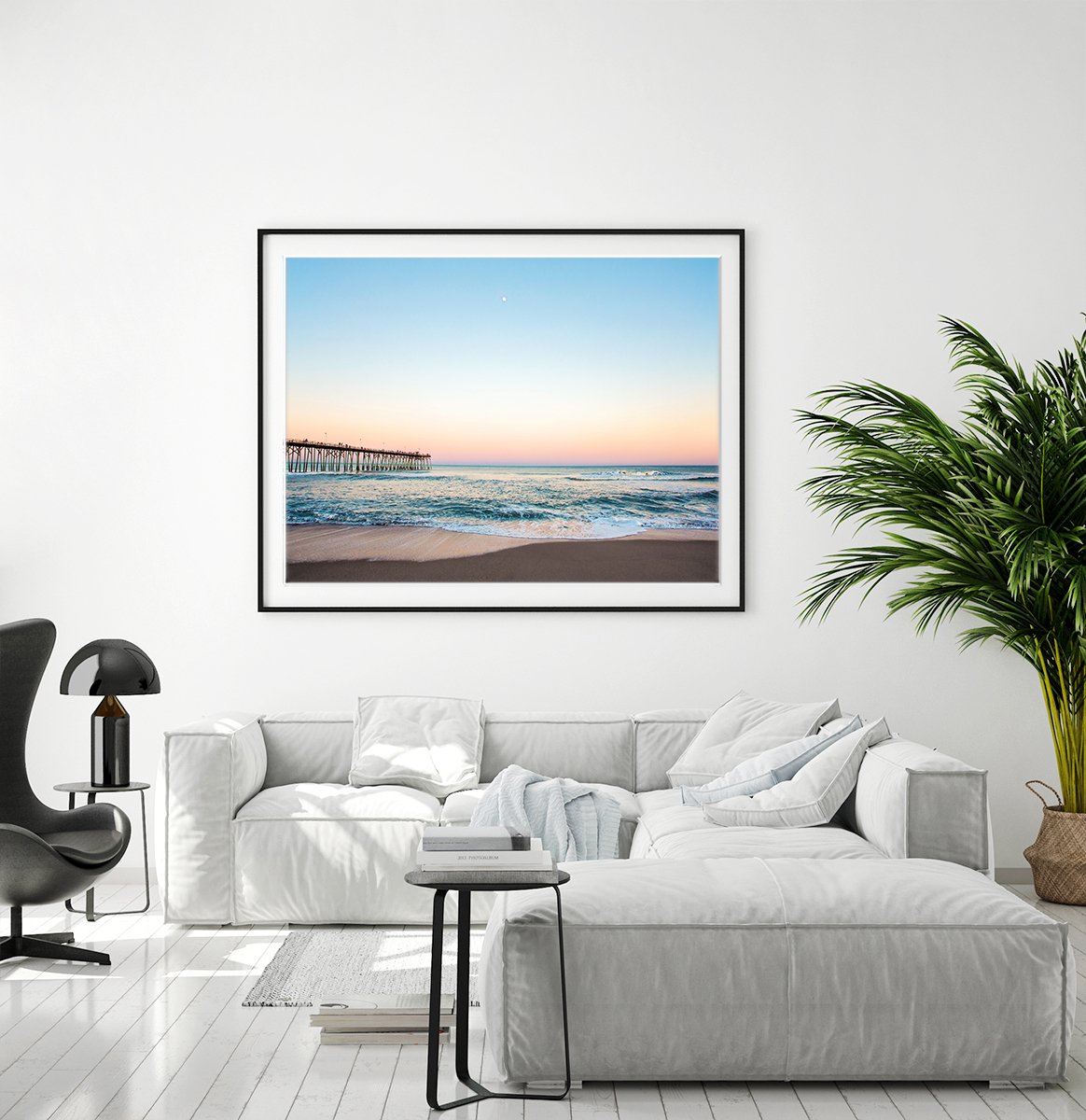 modern living room decor, grey couch, large blue beach photograph by Wright and Roam