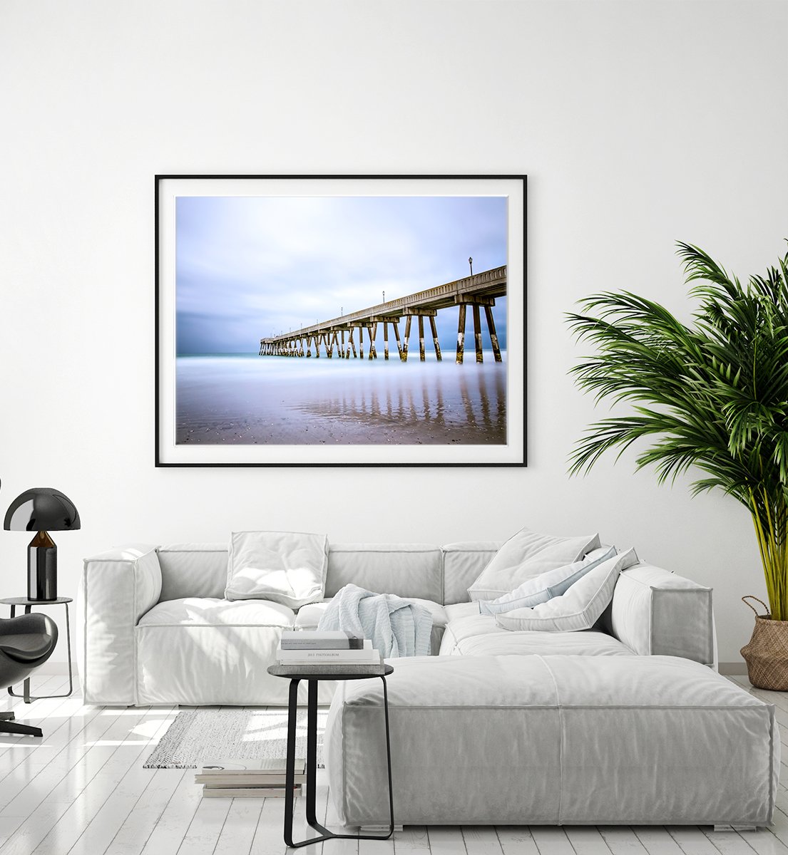 modern living room, grey couch, large blue pier beach photograph by Wright and Roam