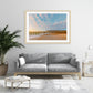 modern coastal living room, large framed beach photograph